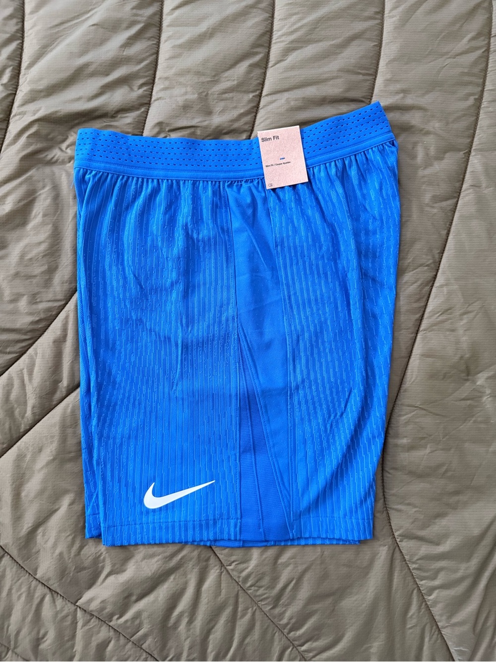 Nike ⚽️ Blue textured Athletic Shorts with white Swoosh